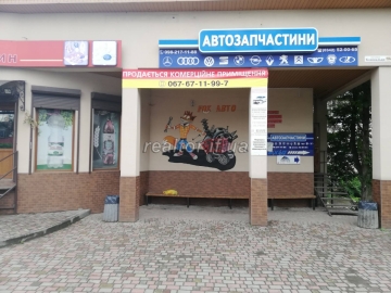 For sale two-storey commercial space with two existing shops